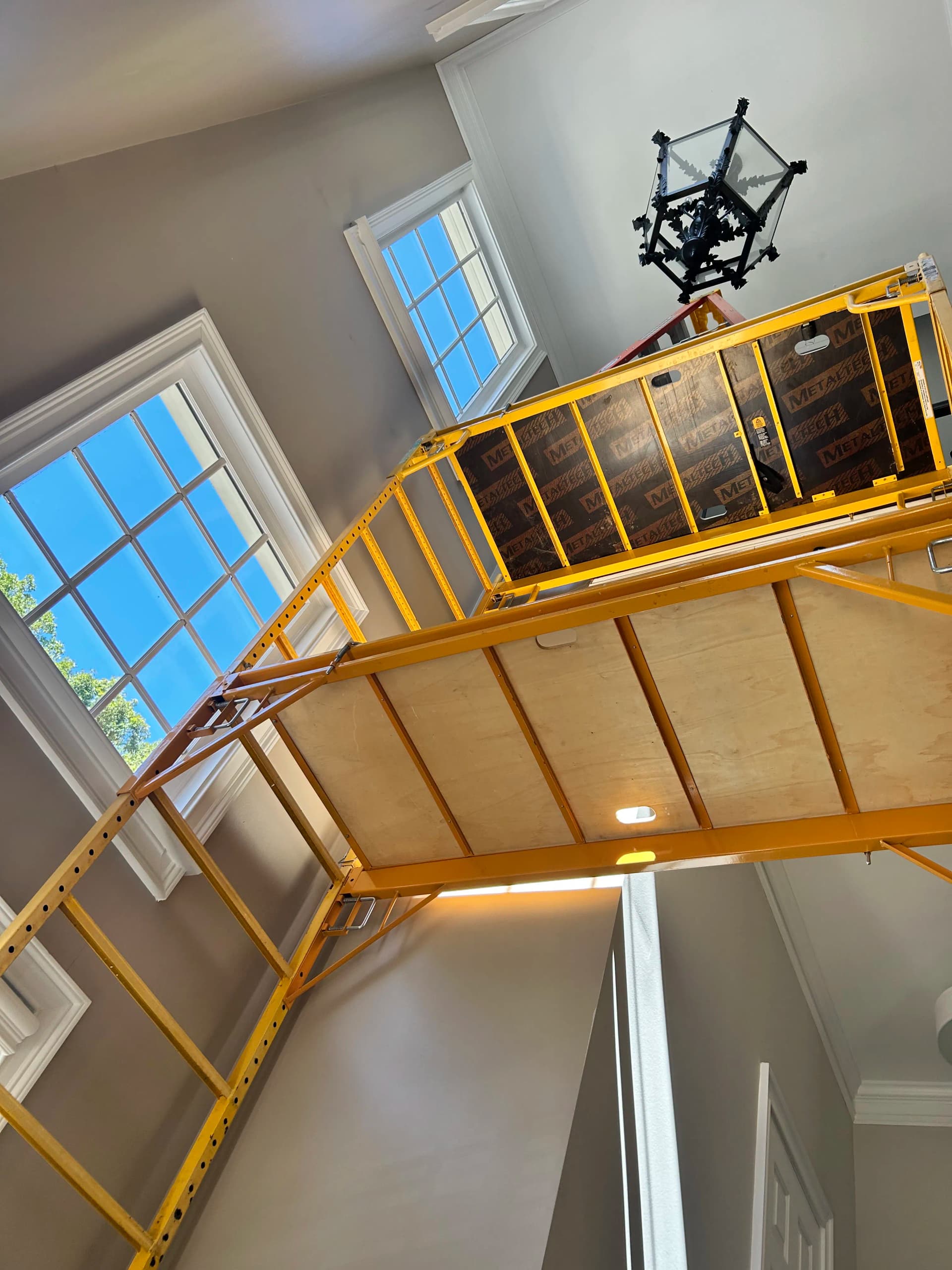 32-Foot Foyer Chandelier Swap in Alpharetta Required Scaffolding image